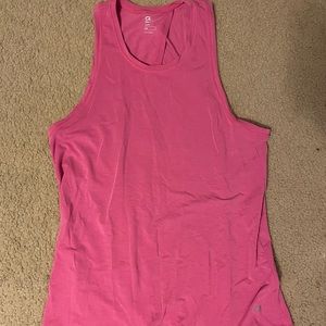 Pink athletic tank top with an open back
